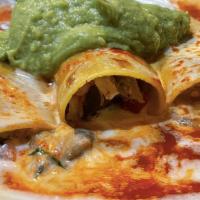 Enchiladas De Cerdo · Three pork enchiladas cooked with pico de gallo topped with cheese dip, our homemade red sau...