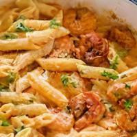 Cajun Pasta With Garlic Toast · Grilled chicken , shrimp, fettuccine noodles in Cajun Alfredo Parmesan sauce or sweet basil ...