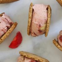 Strawberry Shortcake · Strawberry ice cream with a strawberry swirl + house-made gluten-free shortcake pieces sandw...