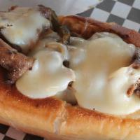 Philly Cheese Steak · Topped with onions, peppers and provolone cheese.