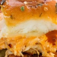 Buffalo Chicken Sliders (3) · Tossed in Buffalo sauce, topped with smoked bacon, blue cheese and ranch dressing.  Served w...
