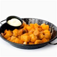 Alioli Potatoes · Tasty & Crispy fried potato cubes served wth homemade creamy garlic sauce