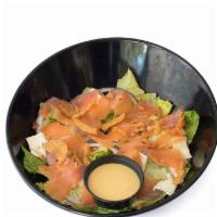 Nordic · Romaine lettuce, smoked salmon, brie cheese, red onion, crispy onion and honey mustard dress...