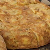 Tortilla Española · Traditional Omelette from Spain with potatoes, eggs and onions