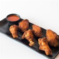 Chicken Wings · Delicious Chicken Wings served with Buffalo Sauce