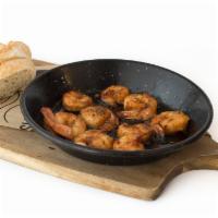 Gambas Al Ajillo · Fresh Shrimps marinated for 24 hours with Extra Virgin Oil, Garlic and Paprika