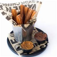 Churros · Famous churros from Spain. 6 delicious fried dough pastries served with your choice of dulce...