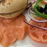 Lox Platter · Served with lettuce, tomato, onions, cucumber, olives, cream cheese, and butter.