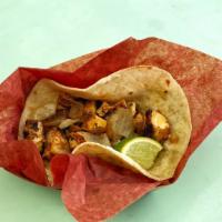 Chicken Al Carbon Taco · Grilled chicken, smoked onions, and pico