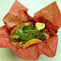 The Oaxaca Taco · Grilled queso oaxaca, poblano, mushroom, salsa verde.
