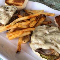 Million Dollar Minis · Two juicy seasoned mid-sized burgers topped with grilled onions, American cheese, and pickle...