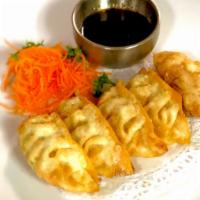 Gyoza (5 Pc) · Japanese pork pot stickers, served steamed or fried.