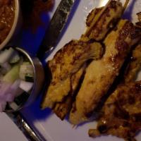 Satee B-B-Q (5 Pc) · Skewered chicken served with peanut sauce and cucumber relish.