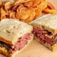 Famous Pastrami Sandwich · Angus beef brisket with spicy mustard on rye or potato roll.