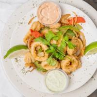 Lime Fried Calamari · Battered in our own herbs and spices with a hint of lime. A dozen fried fresh calamari serve...