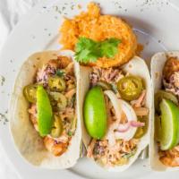 Shrimp · Three delicious, lightly-breaded shrimp tacos in your choice of tortillas filled with chipot...