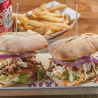 Bbq Pulled Sandwich · Pulled BBQ brisket, caramelized onion, lettuce, tomato and spicy mayo.