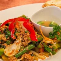 Spicy Thai Basil (Stir Fried) · W/fresh crushed chili, garlic, green beans, bell pepper & basil leaves.