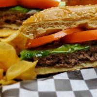 The Signature - Beef Burger · A classic burger with our signature taste. 1/3 angus beef burger with mayo, tomato and lettu...