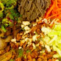 Thai Me Up · Vegan, contains nuts. Seasoned Brussels, soba noodles tossed 
in Thai peanut sauce, shredded...