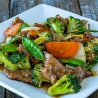 Beef With Broccoli · Flank steaks with broccoli and carrots, in a brown sauce.