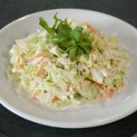 Cole Slaw · Vegetarian. White cabbage, carrot, mayo, sugar and spices.