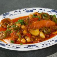 Moroccan Salmon Fish · Salmon fish, chickpeas, peppers, cilantro and spices.