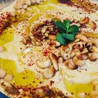 Hummus Fatteh · Served cold. Hummus, pita and yogurt sauce. Look out tummy, here it comes!