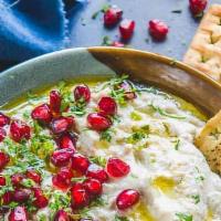 Mutabal · Mutabal is an incredibly delicious eggplant dip made with tahini and served with pita. Photo...