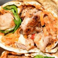 Chicken Kabab Sandwich · Ground chicken and special spices and vegetables. Photo does not represent final product or ...