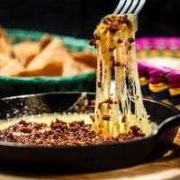 Queso Fundido · Skillet Melted White Mexican Cheese.