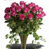 Dreaming In Pink - 18 Long Stemmed Pink Roses · Make a statement! This lush arrangement of hot pink roses and gracefully trailing ivy can be...