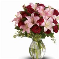 Lavish Love Bouquet With Long Stemmed Red Roses · Lavish your loved one with luxuriant reds and pinks. A romantic anniversary gift or sumptuou...