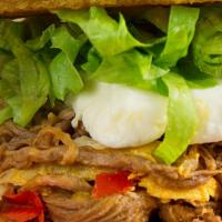 Shredded Beef Toston · A fried whole green plantain with shredded beef, shredded white cheese, lettuce, garlic and ...