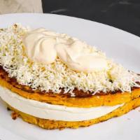 Cheese Cachapas · A cachapa is a sweet corn pancake traditionally made from ground sweet corn and usually serv...