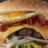 Venezuelan Burger · Juicy burger topped with muster cheese, bacon, fried egg, lettuce, tomato, onion, potato sti...