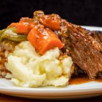 Oven Roasted Pot Roast  · Tender Post Roast Slow cooked with Potatoes, Carrots, Celery, and Green Peppers Served with ...