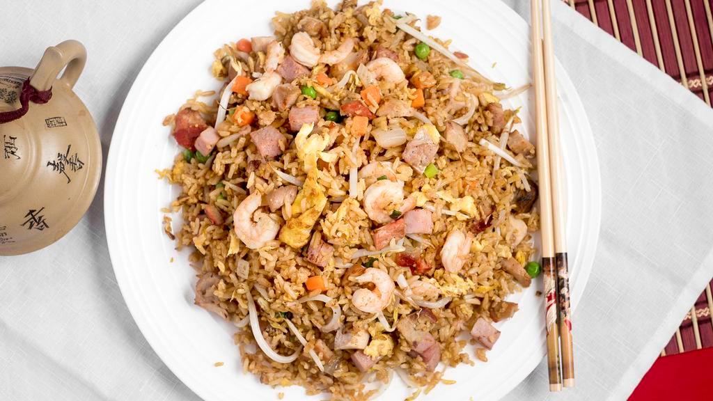 Special Fried Rice · Rice woked with ham, roast pork, chicken, shrimp, egg, bean sprouts, peas and carrots.