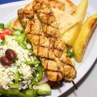 Chicken Souvlaki Platter · Chunks of marinated chicken on skewers cooked on a charbroil.