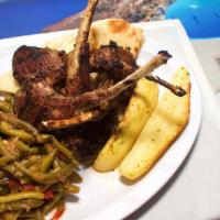 Lamb Chop Platter · Fire-grilled lamb chops marinated in fresh herbs. Please Specify Cooking Temperature