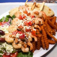 Athenian Shrimp Platter · Three shrimp skewers grilled and topped with grilled tomatoes, Feta cheese, and oregano.