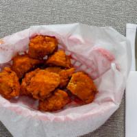 Boneless Wings Basket · Includes nine wings with french fries and drink.