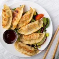 Vegetable & Pork Pot Stickers (6 Pcs) · Pork and vegetable stuffed pot stickers steamed or golden fried, served with our sweet soy d...
