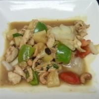 Pineapple Chicken · Sautéed chicken breast with pineapple chunks, cashews, onions, raisins, bell peppers and cur...