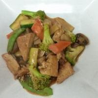 Spicy Vegetables Tofu · Spicy level one. Mixed vegetables and tofu stir fried in spicy brown sauce.