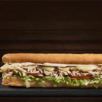 Chicken Sandwich · French bread, shredded chicken breast, mozzarella cheese, lettuce, tomatoes, and home style ...