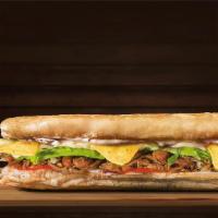 Mexican Sandwich · French bread, shredded beef, chili beans, onions, mozzarella cheese, lettuce, tomatoes, avoc...