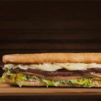 Turkey Sandwich · 100% turkey breast, bacon, mozzarella cheese, lettuce, home style sauce, and honey mustard.