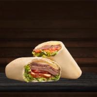 Italian Wrap · Roast beef, ham, salami, mozzarella cheese, parmesan cheese, tomatoes, romaine lettuce, basi...