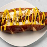 Chow Chow · Carrot Dawg in pretzel bun w your choice of various toppin’s